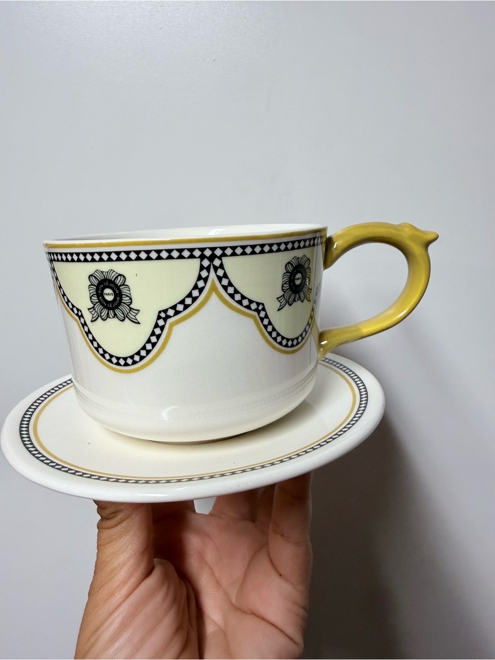Anthropologie Yellow-Handled Porcelain Teacup and Saucer Set